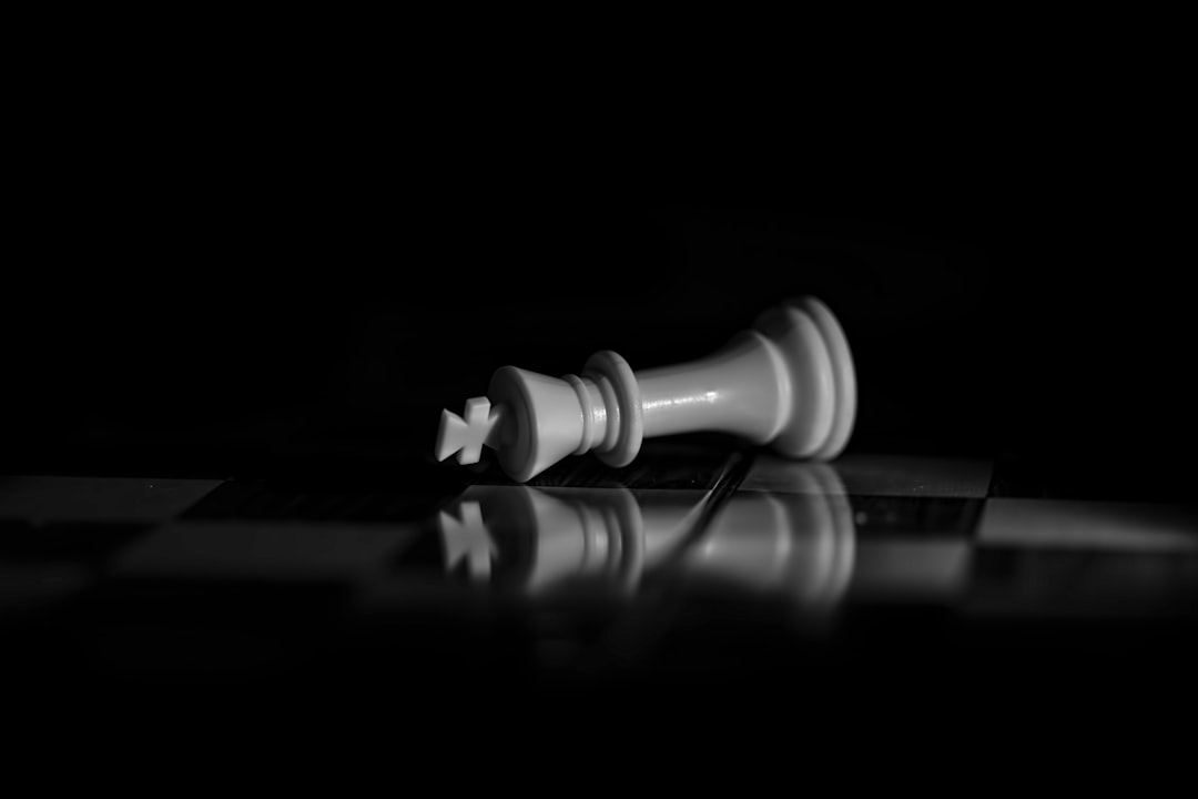 Gray metal pipe on black surface