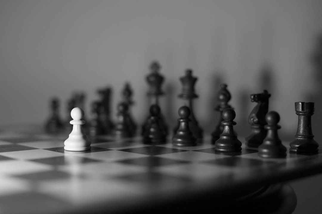A black and white photo of a chess board
